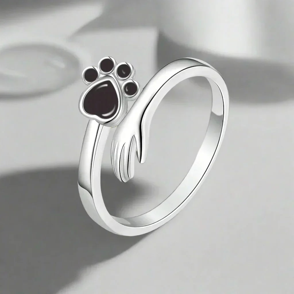 MARA β Elegant adjustable ring made of 925 sterling silver with handcrafted hand and paw motif