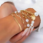 Chic Gold 4-Piece Bracelet Set – Snake, Pearls & Links | Gold-Westeryn