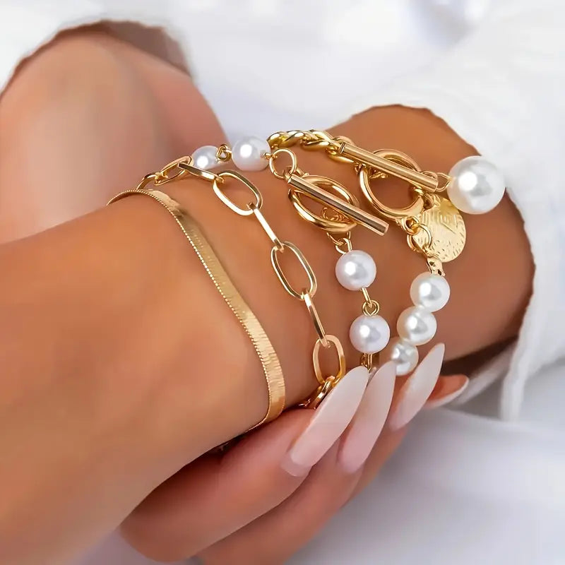 Chic Gold 4-Piece Bracelet Set – Snake, Pearls & Links | Gold-Westeryn