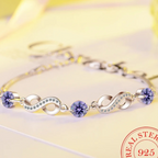 Silver Infinity Bracelet with Beautiful Colored Zircon Stones-Westeryn