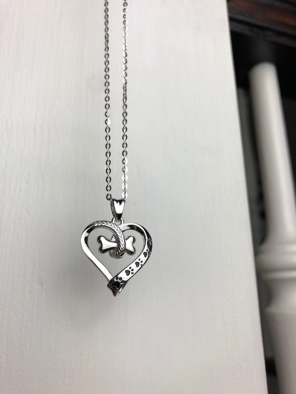 NALA – Elegant Stainless Steel Necklace with Charming Paw and Heart Design-Westeryn