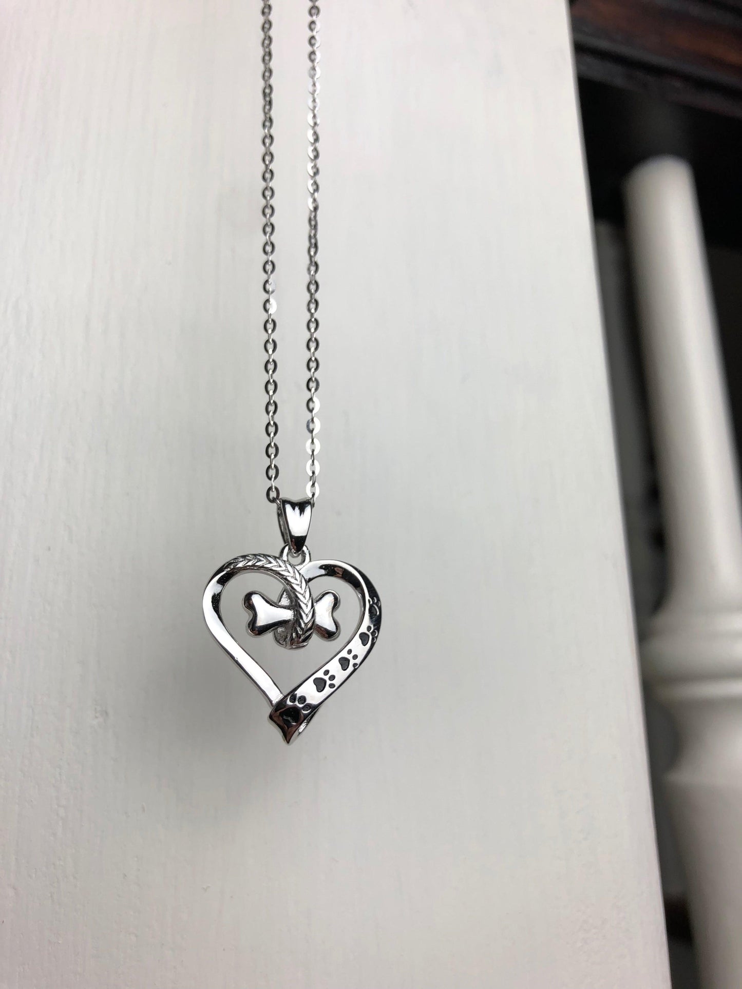 NALA – Elegant Stainless Steel Necklace with Charming Paw and Heart Design