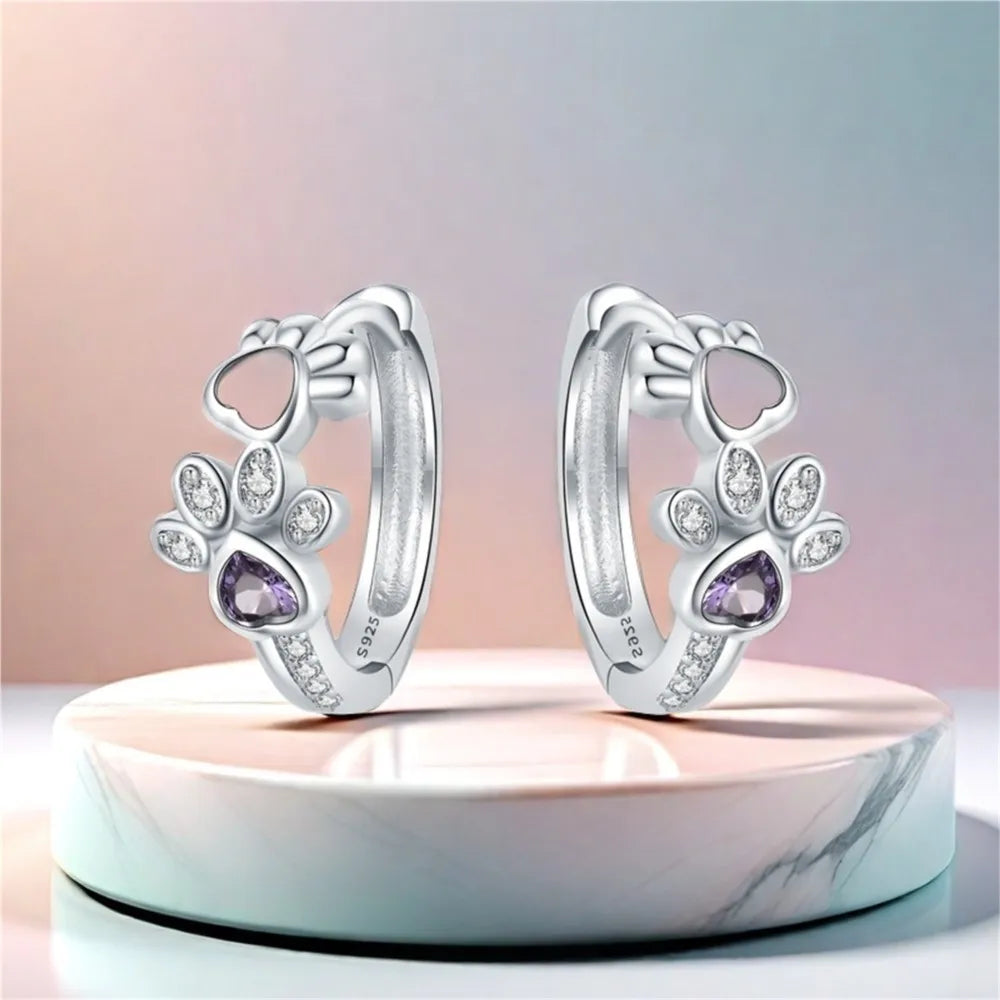 Elegant ILLA Paw Huggie Earrings made of 925 Sterling Silver with Sparkling Zirconia and Heart Stone