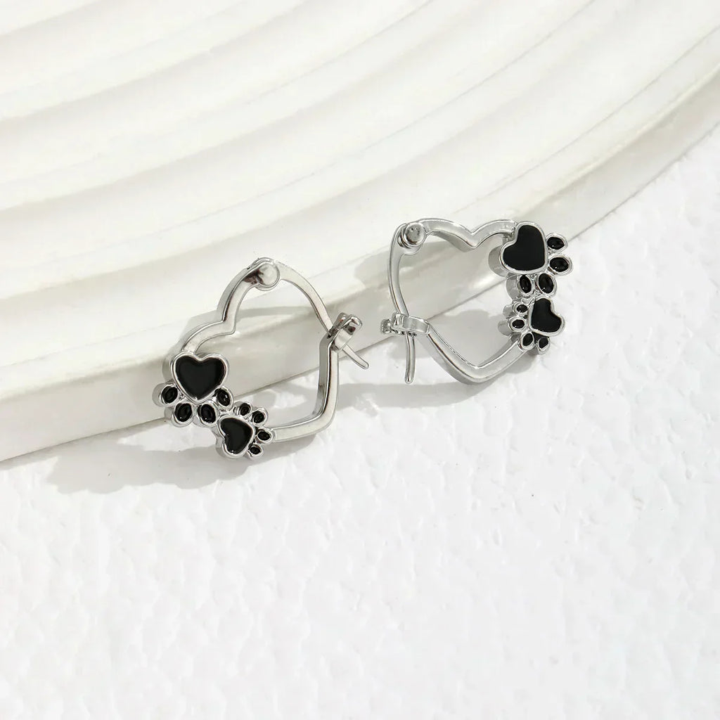 NOVA – Elegant Huggie Earrings with Heart & Paw in Silver Look and Black Enamel for a Stylish Appearance-Westeryn