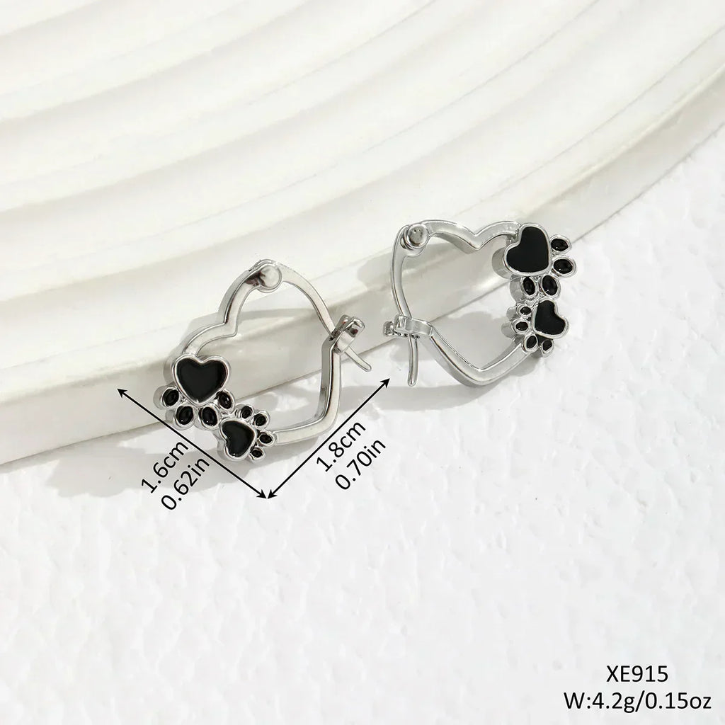 NOVA – Elegant Huggie Earrings with Heart & Paw in Silver Look and Black Enamel for a Stylish Appearance-Westeryn