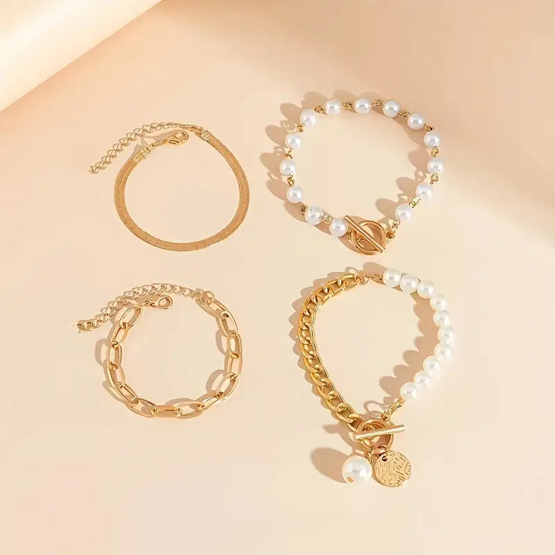 Chic Gold 4-Piece Bracelet Set – Snake, Pearls & Links | Gold-Westeryn