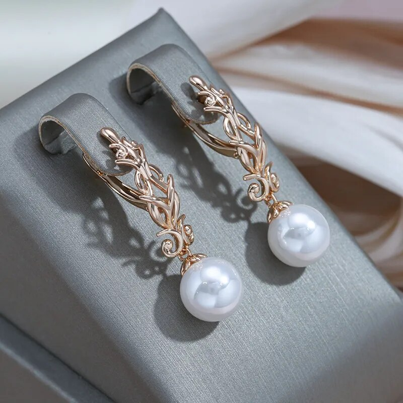 Elegant dangling pearl earrings-Westeryn